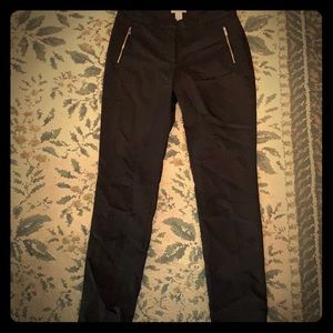 Black h&m dress pants with zipper pocket decal
